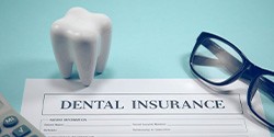 Dental insurance claim for on blue background