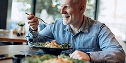 an older man enjoying a healthy meal