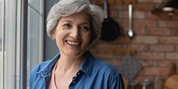 Woman smiling with dentures